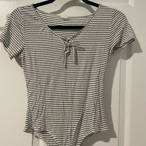 Black and white stripped bodysuit